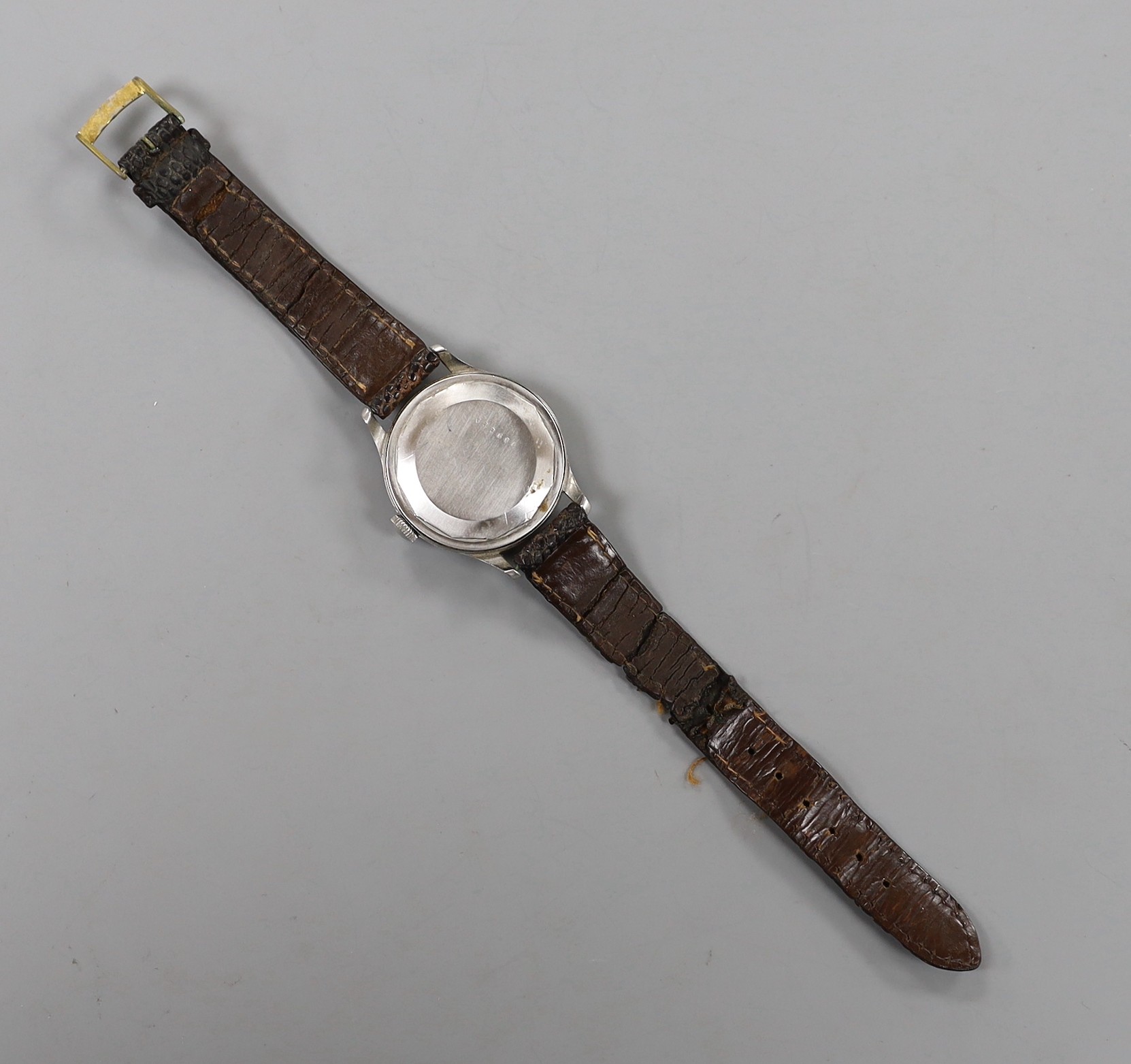 A gentleman's stainless steel Jaeger LeCoultre manual wind wrist watch, with Arabic dial and subsidiary seconds, on associated leather strap.